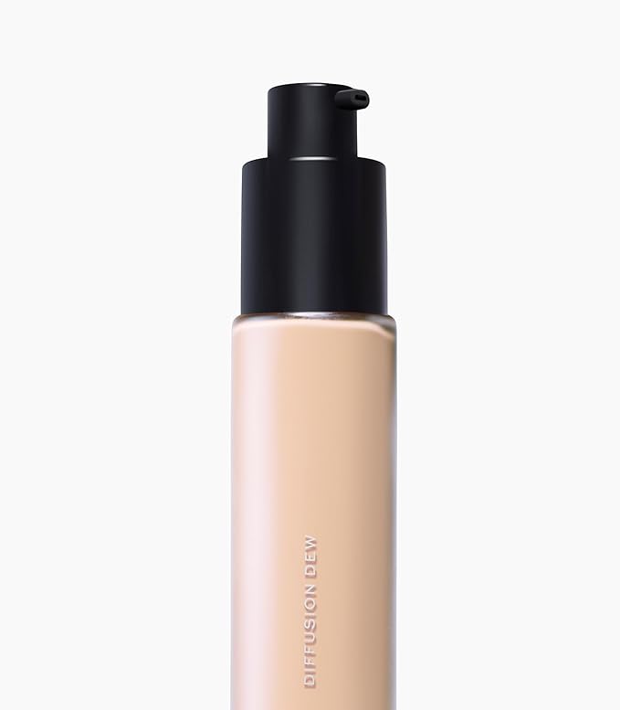 MAKE Beauty Diffusion Dew Skin Tint. Sheer to Medium Coverage Radiant Finish. Blurring, Smoothing, and Brightening for Glowing Complexion. Enhanced with Niacinamide and Adenosine. Neutral 02