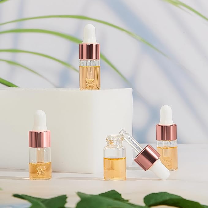 200 Pcs Mini Glass Oil Dropper Bottle Bulk, Clear Essential Small Empty Bottles Sample Containers Perfume Liquid Vials with Cap for Traveling (3 ml,Rose Gold)