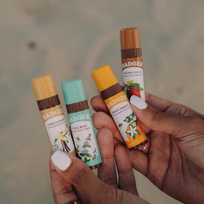 Badger Cocoa Butter Lip Balm Set, 100% Organic, Long Lasting Lip Moisturizers, Lip Care Variety Pack (Cocoa, Orange, Mint & Vanilla), All Natural Lip Balms, 4-pack