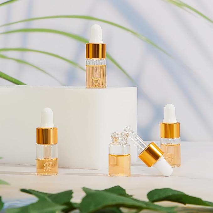 200 Pcs Mini Glass Oil Dropper Bottle Bulk, Clear Essential Small Empty Bottles Sample Containers Perfume Liquid Vials with Cap for Traveling (3 ml,Gold)