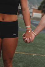 K'lani Game Day Hair Tie Bracelets – 5-Pack Stretchy No-Crease Hair Ties & Stylish Bracelets – Team Color Accessory for Hair or Wrist - Orange & White, Medium