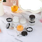 24 Pack 1oz Clear Glass Jars Small Glass Containers with Black Metal Lids Empty Cosmetic Jars with Inner Liners and Lids Clear Glass Lotion Jars with Labels for Traveling