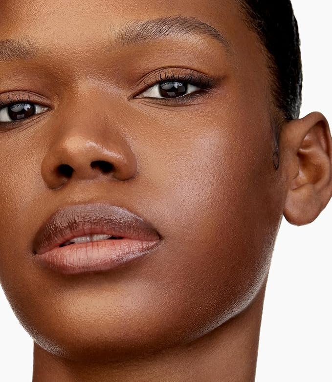 MAKE Beauty Diffusion Dew Skin Tint. Sheer to Medium Coverage Radiant Finish. Blurring, Smoothing, and Brightening for Glowing Complexion. Enhanced with Niacinamide and Adenosine. Rich Cocoa 18