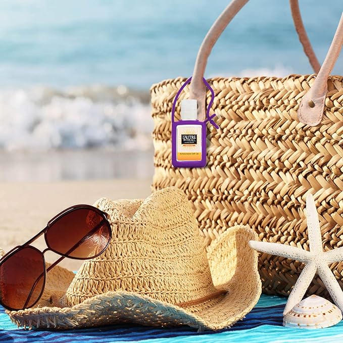 SPF 30 Sunscreen Multi-Pack by L'AUTRE PEAU | Travel Size Sunscreen for Men, Women & Kids | Non-Greasy, Water Resistant | Tropical Scent | TSA Approved | 4 Pack With Travel Strap