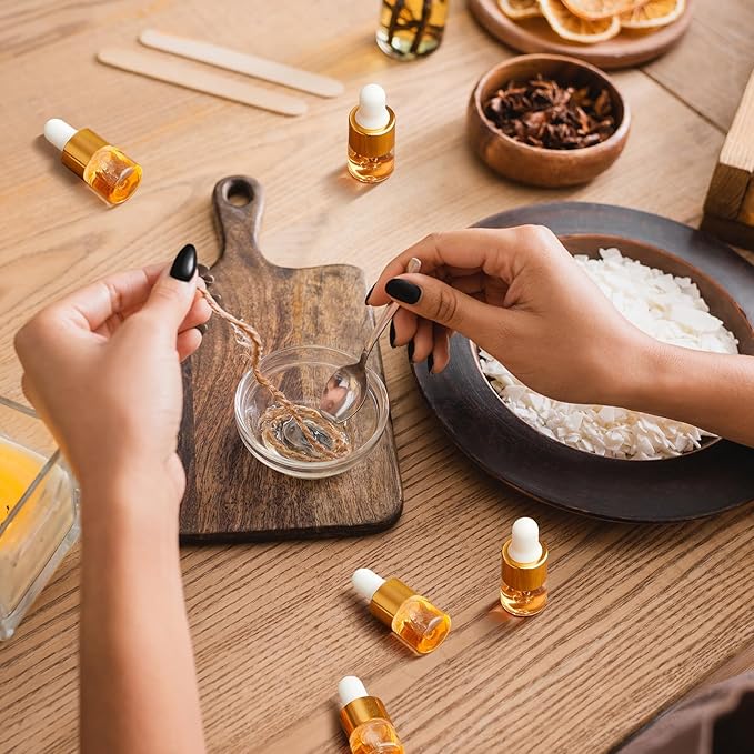 200 Pcs Mini Glass Oil Dropper Bottle Bulk, Clear Essential Small Empty Bottles Sample Containers Perfume Liquid Vials with Cap for Traveling (1 ml,Gold)