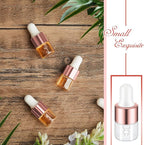 200 Pcs Mini Glass Oil Dropper Bottle Bulk, Clear Essential Small Empty Bottles Sample Containers Perfume Liquid Vials with Cap for Traveling (1 ml,Rose Gold)